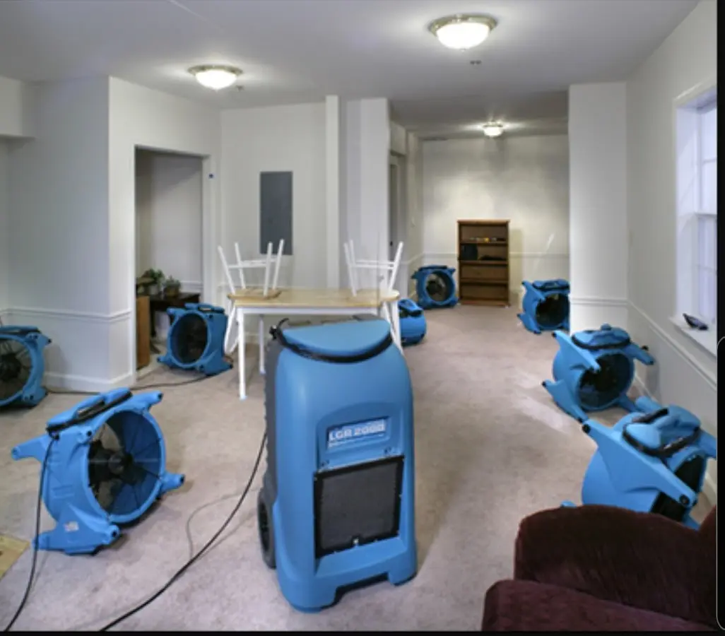 Air movers and dehumidifier setup for Water Damage Restoration in Galloway